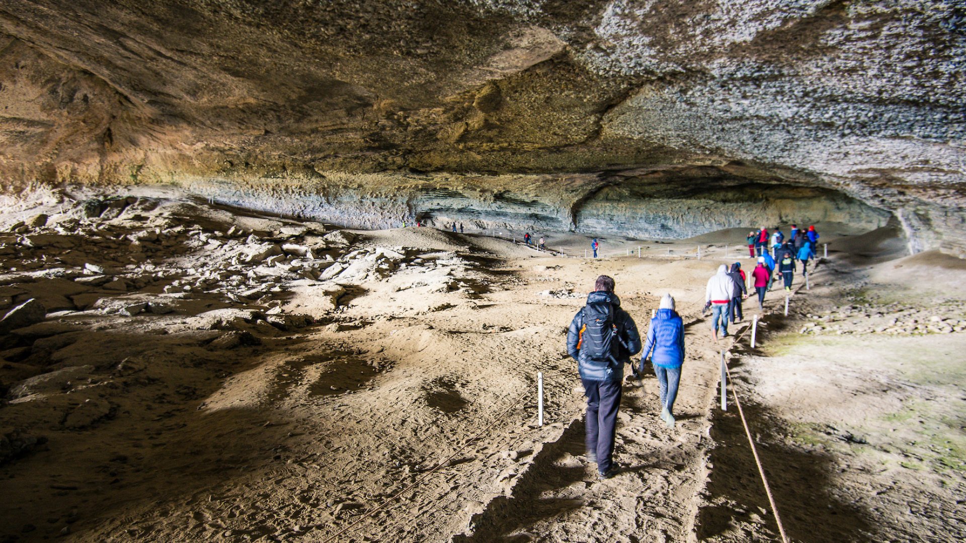 Hiking through a cave in Patagonia