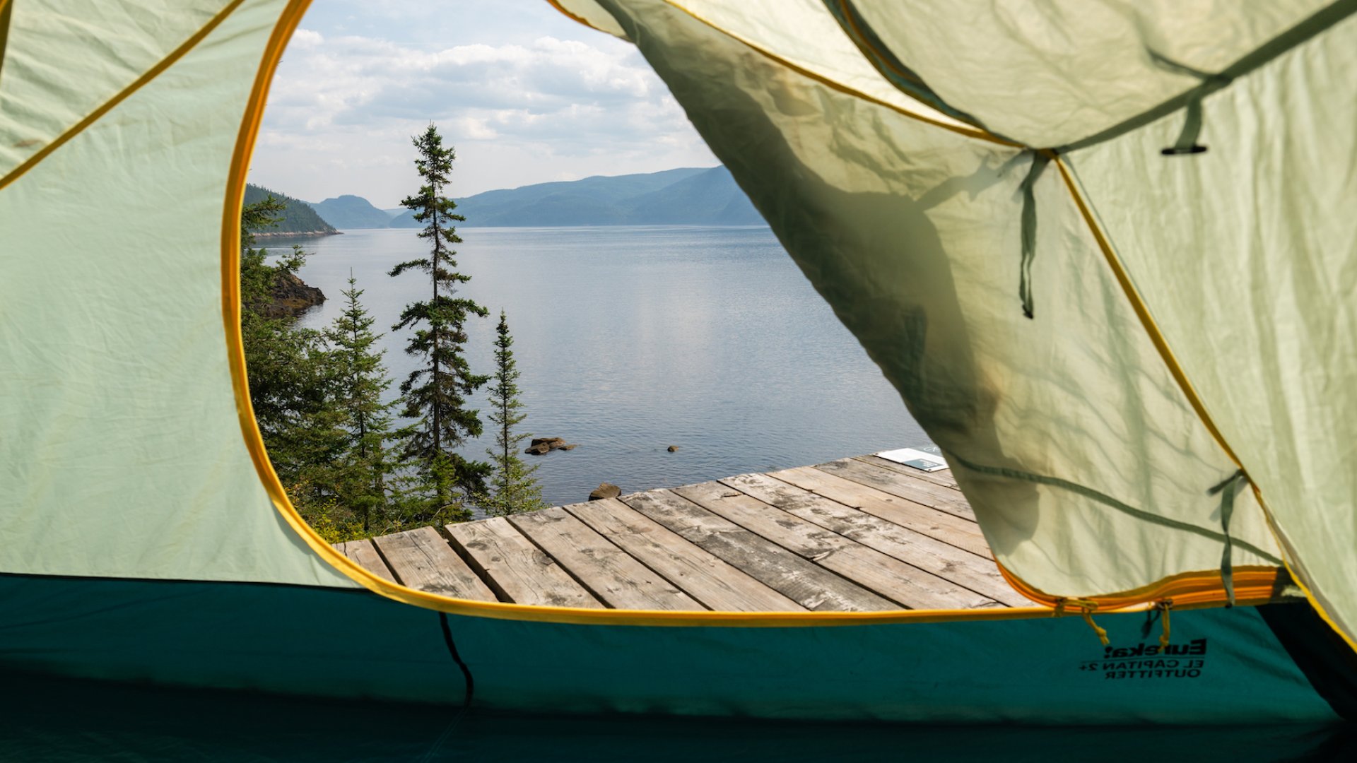View through a tent of the water surrounding Quebec