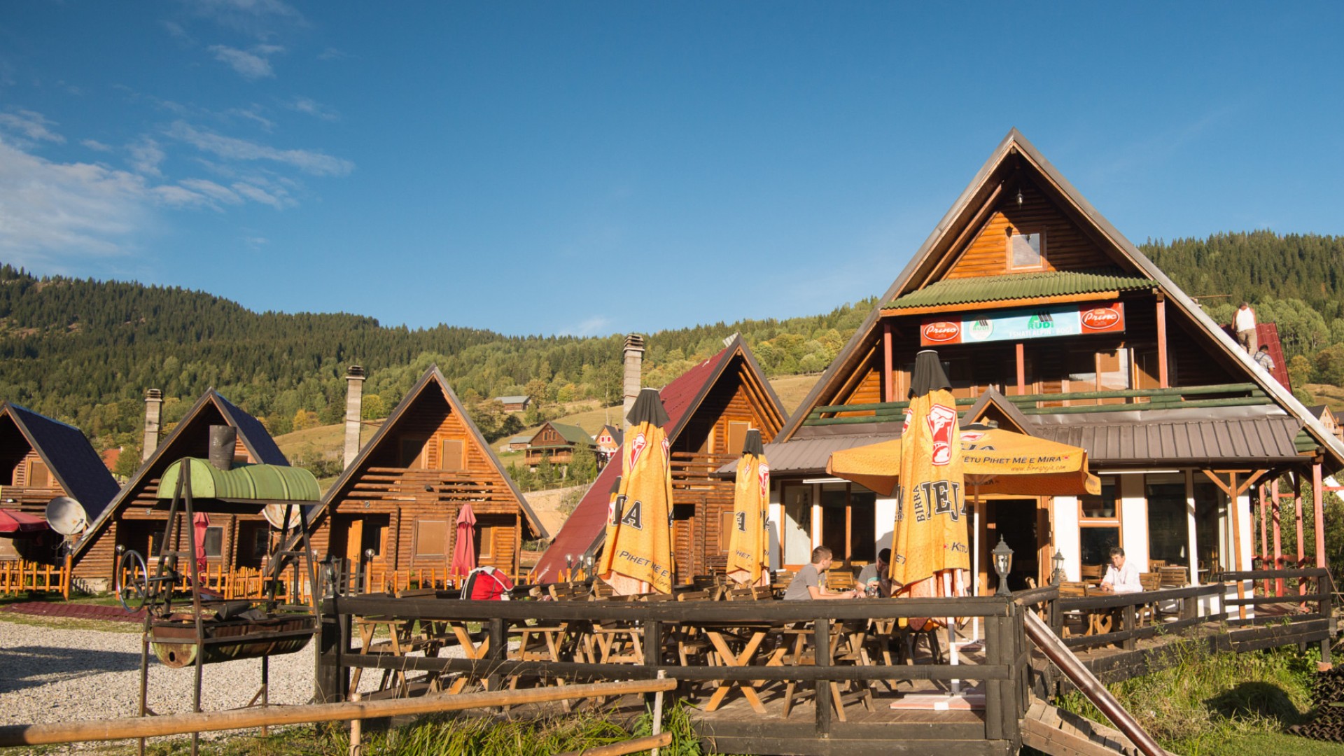 Cabins in a country side town in Albania on a sunny day