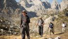Group of hikers trekking through the rugged mountains of northern Albania during a guided Albania hiking tour, part of an unforgettable Europe hiking tour experience.